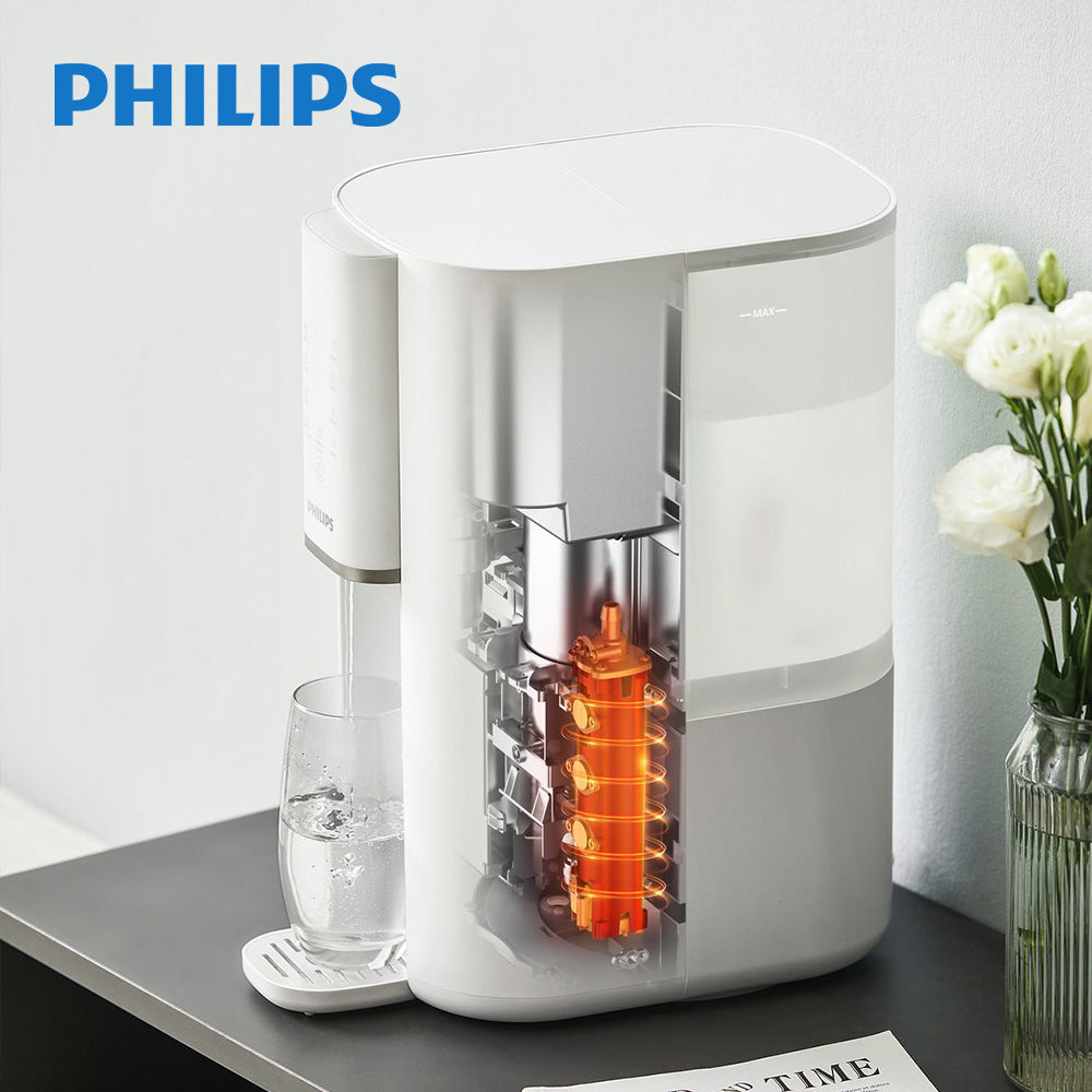 Philips 即熱式純淨飲水機（白色），透明窗可見內部加熱模組